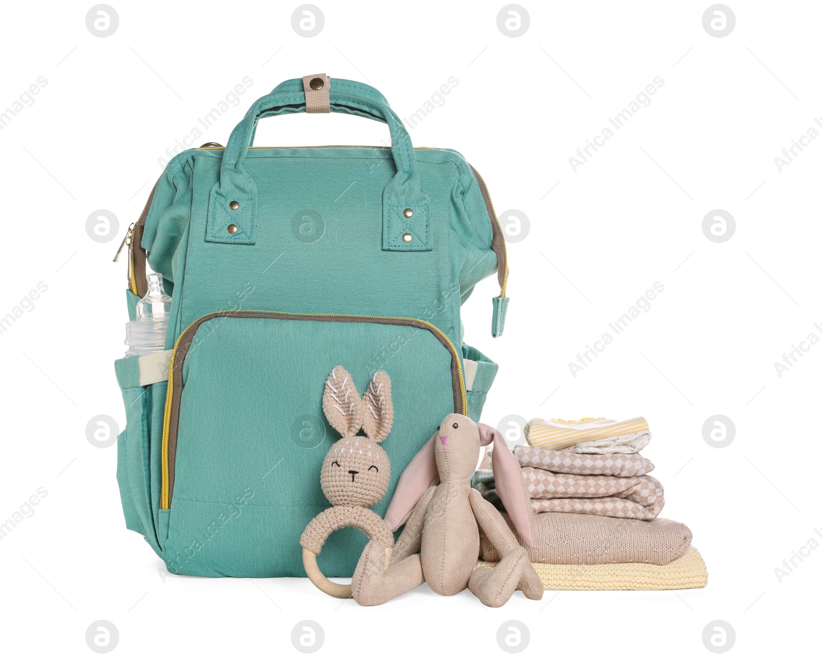 Photo of Mother's bag with baby's stuff isolated on white