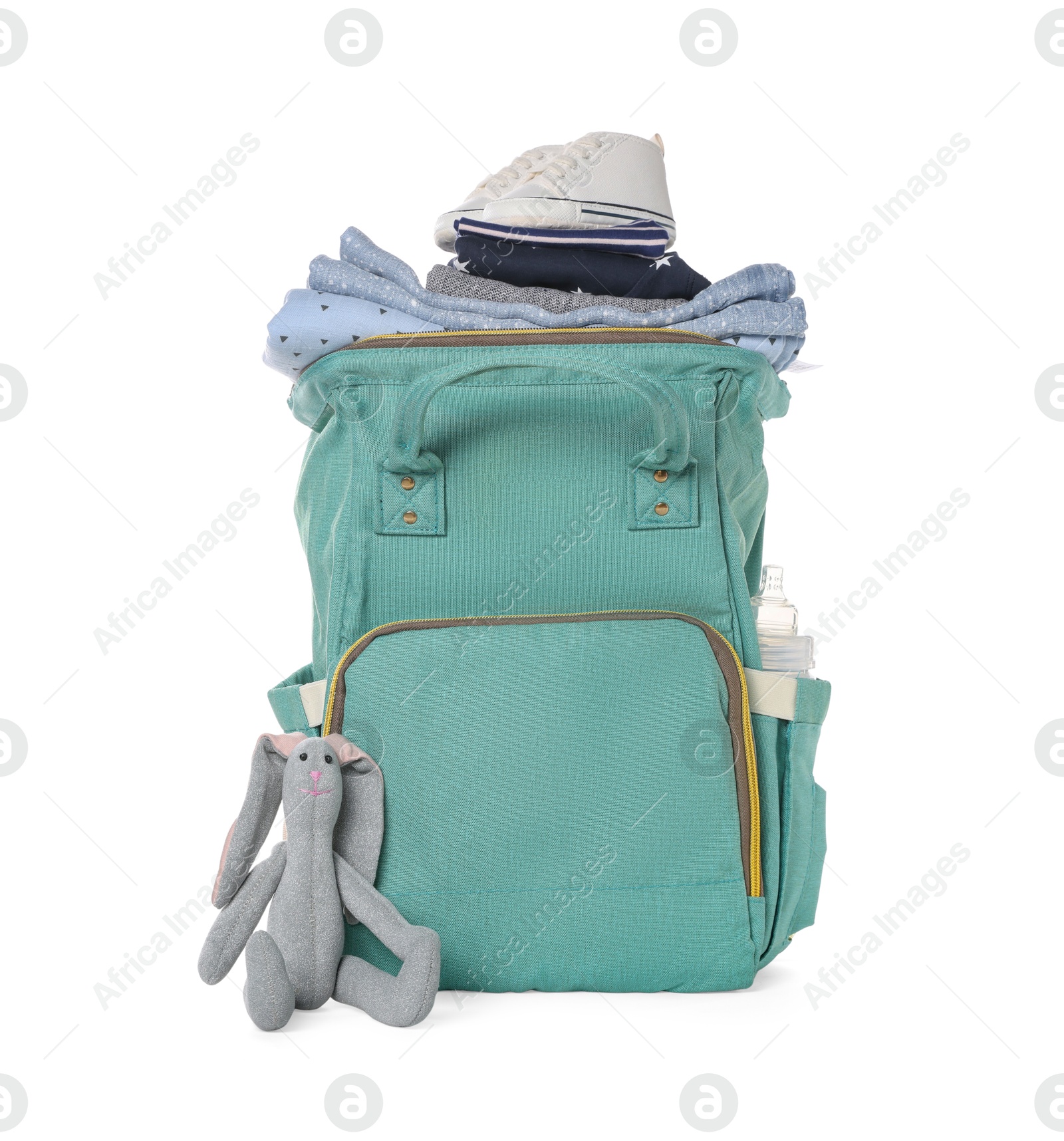 Photo of Mother's bag with baby's stuff isolated on white