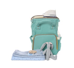 Photo of Mother's bag with baby's stuff isolated on white