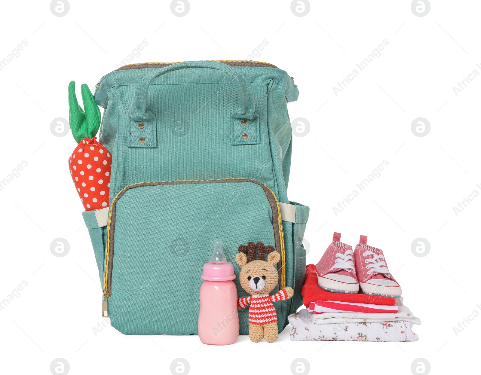 Photo of Mother's bag with baby's stuff isolated on white