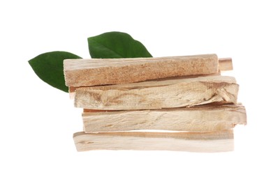 Photo of Palo santo sticks and green leaves on white background