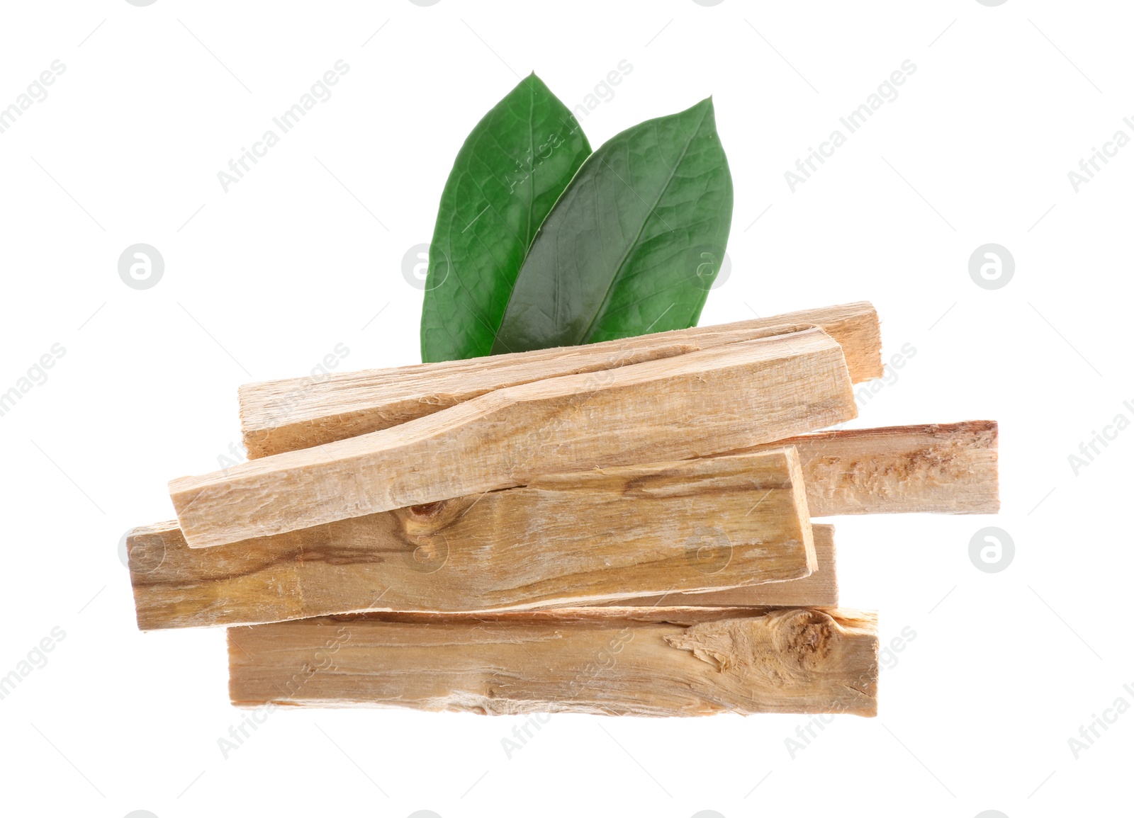 Photo of Palo santo sticks and green leaves on white background