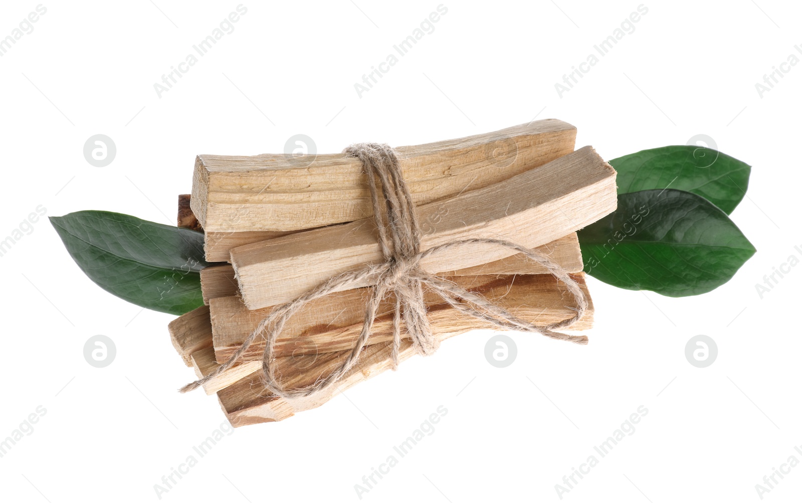 Photo of Palo santo sticks and green leaves on white background