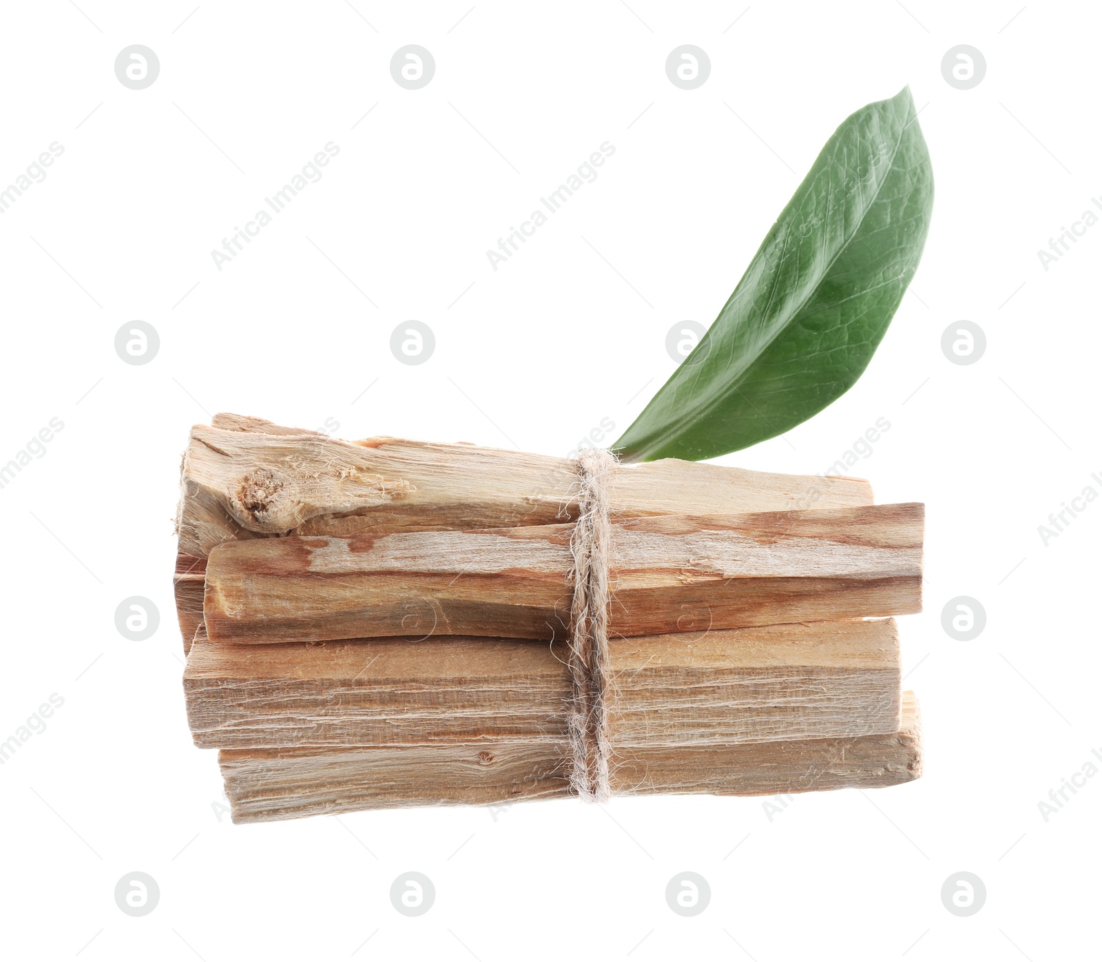 Photo of Palo santo sticks and green leaves on white background