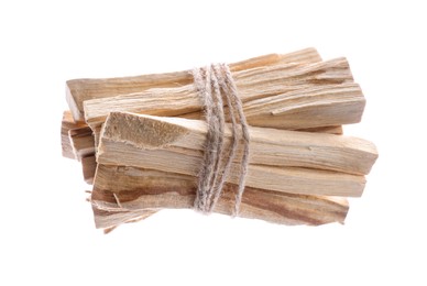 Photo of Bunch of palo santo sticks on white background