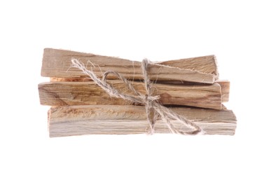 Photo of Bunch of palo santo sticks on white background