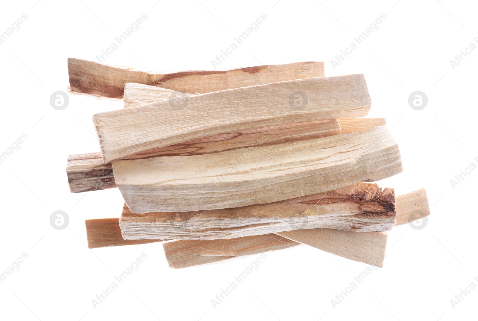 Photo of Pile of palo santo sticks on white background