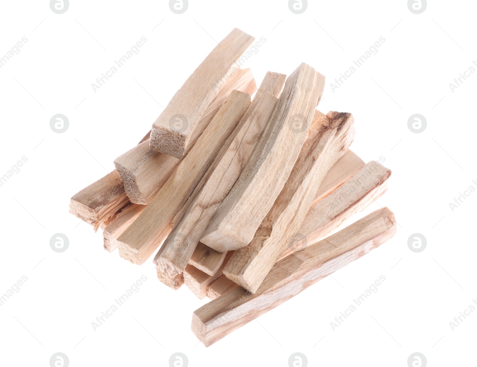 Photo of Pile of palo santo sticks on white background