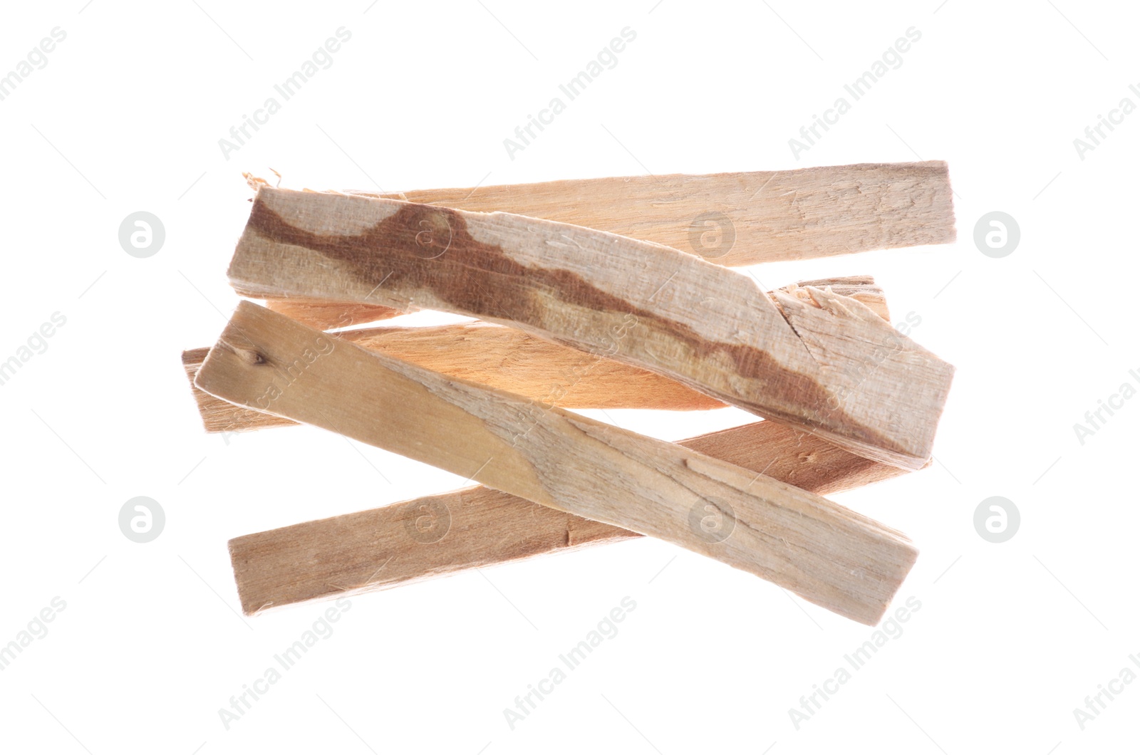 Photo of Pile of palo santo sticks in air on white background, top view