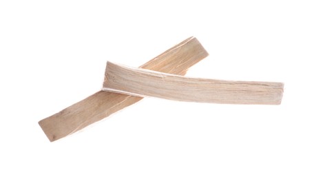 Photo of Palo santo sticks in air on white background