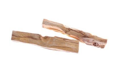 Photo of Palo santo sticks in air on white background