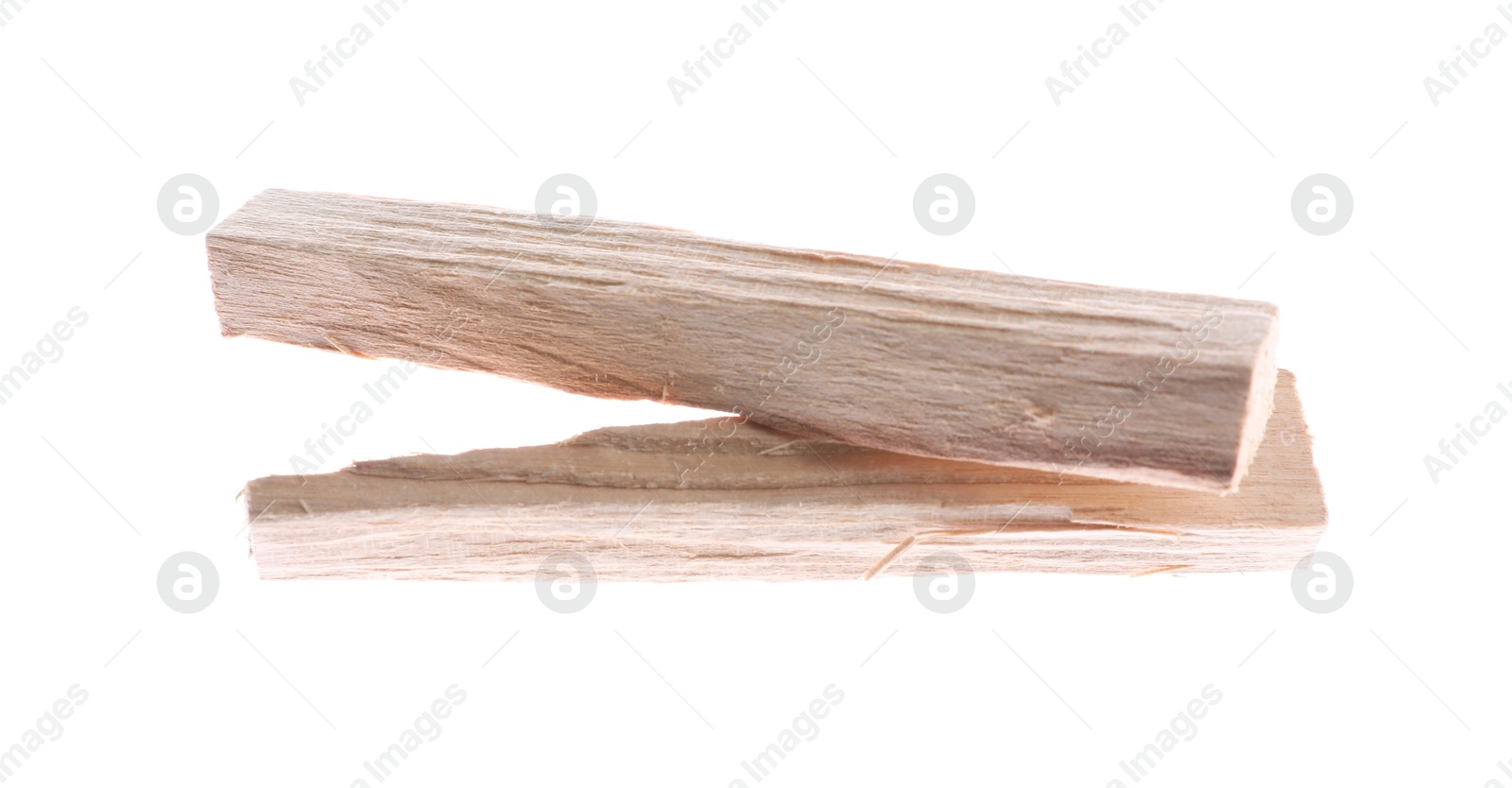 Photo of Two palo santo sticks on white background