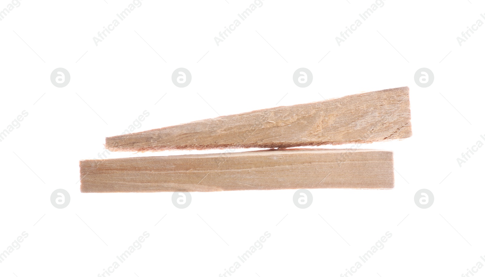 Photo of Two palo santo sticks on white background