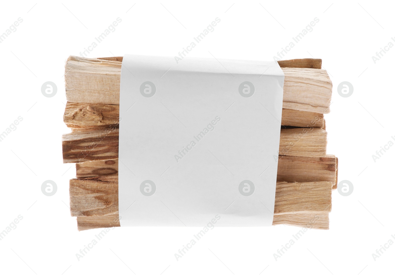 Photo of Palo santo sticks wrapped in paper on white background