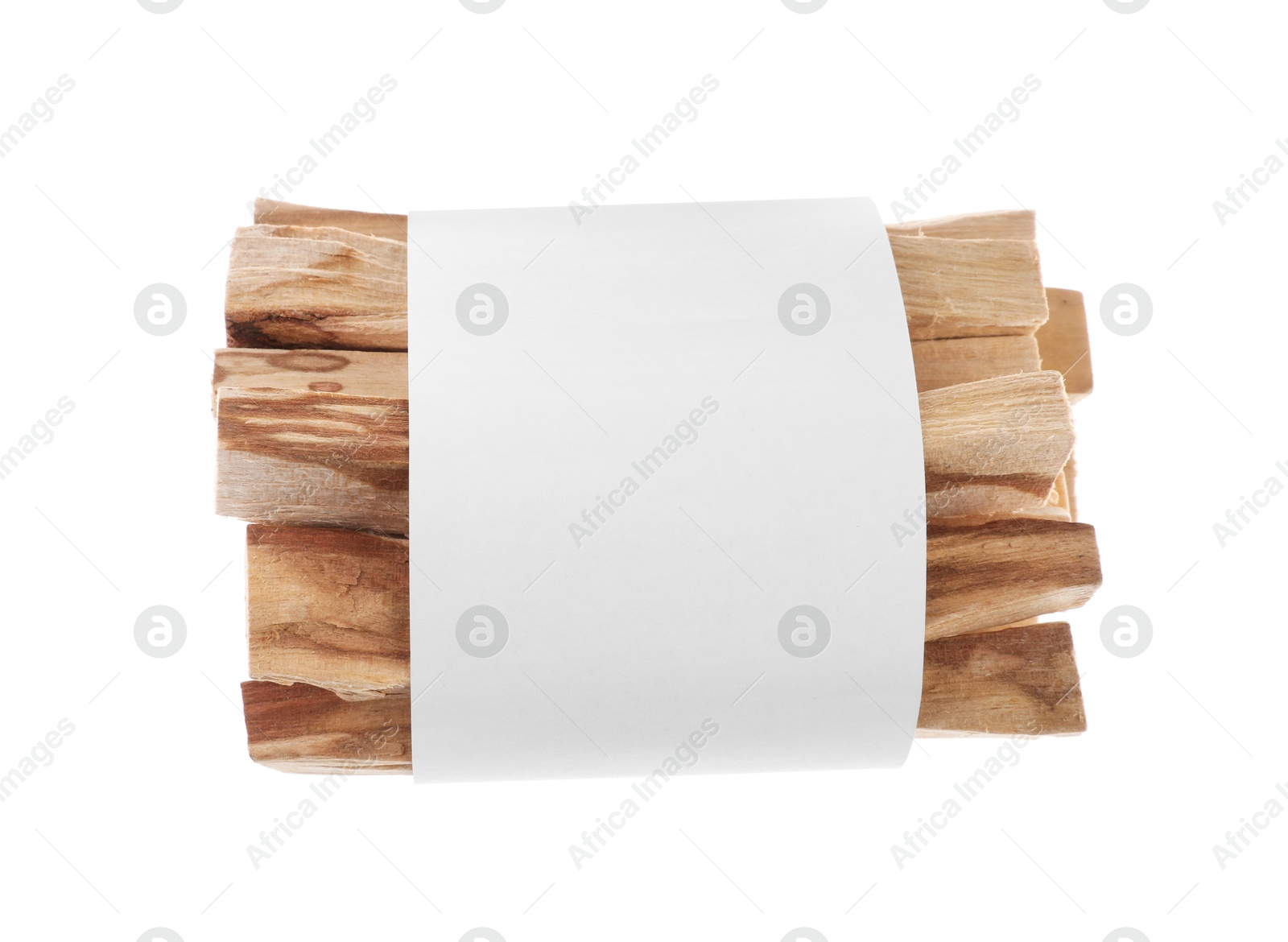 Photo of Palo santo sticks wrapped in paper on white background