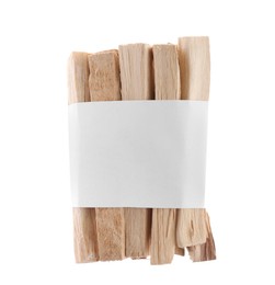 Photo of Palo santo sticks wrapped in paper on white background