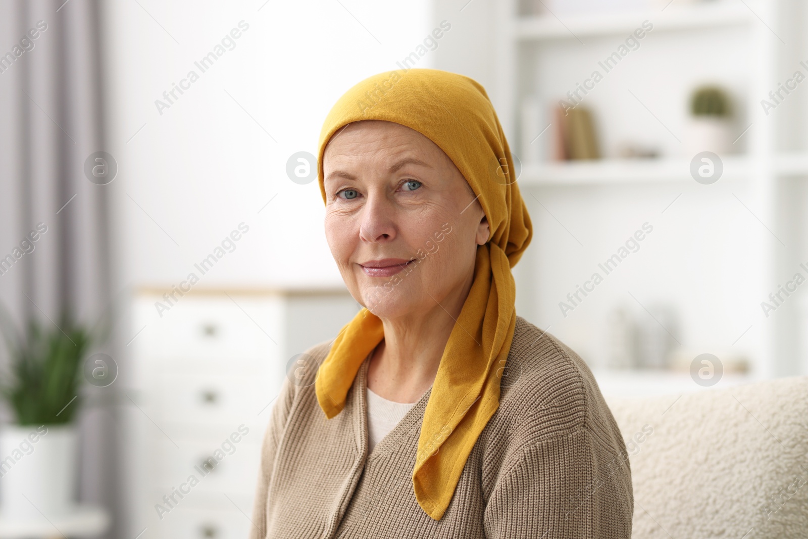 Photo of Portrait of senior woman with cancer at home