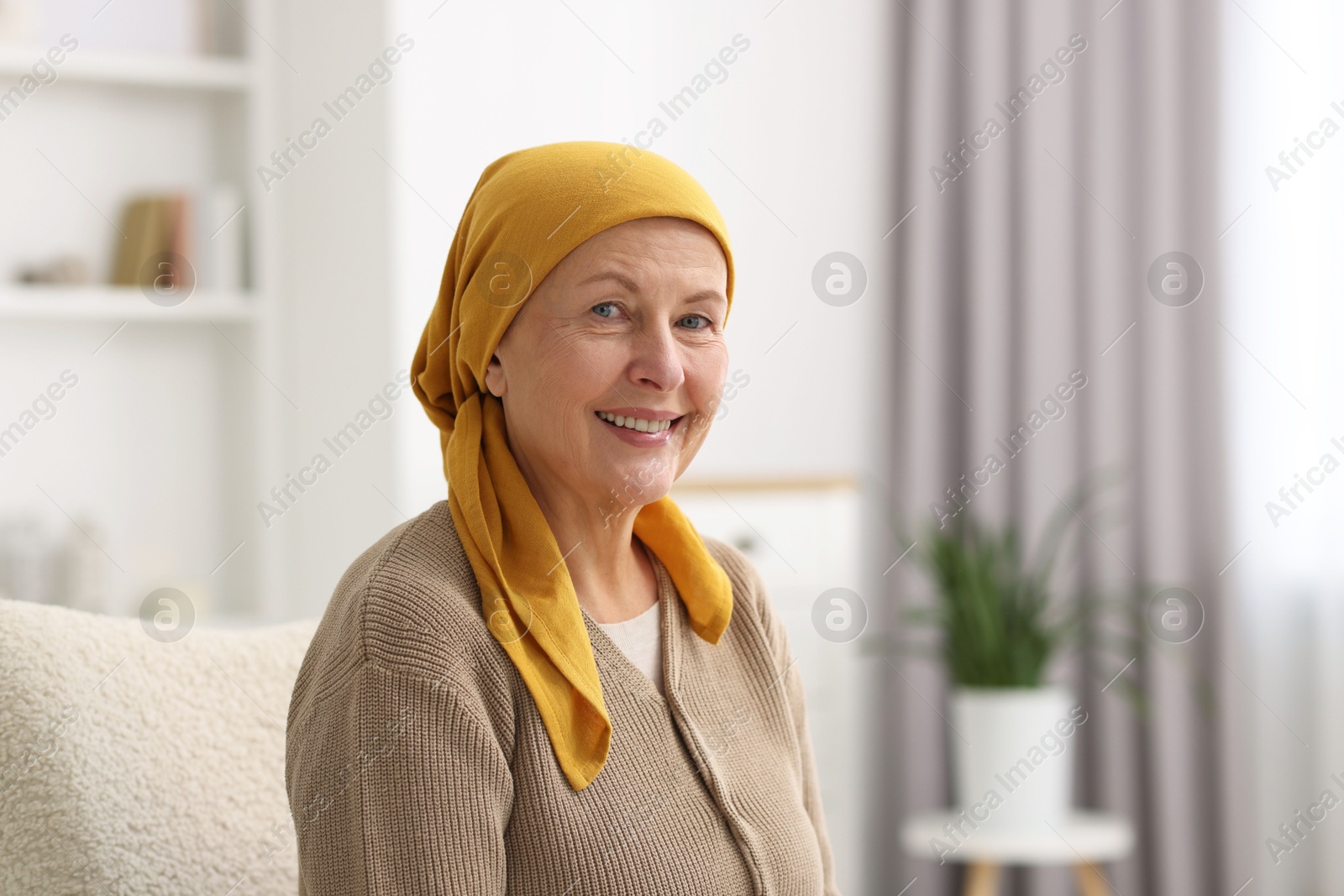 Photo of Portrait of senior woman with cancer at home