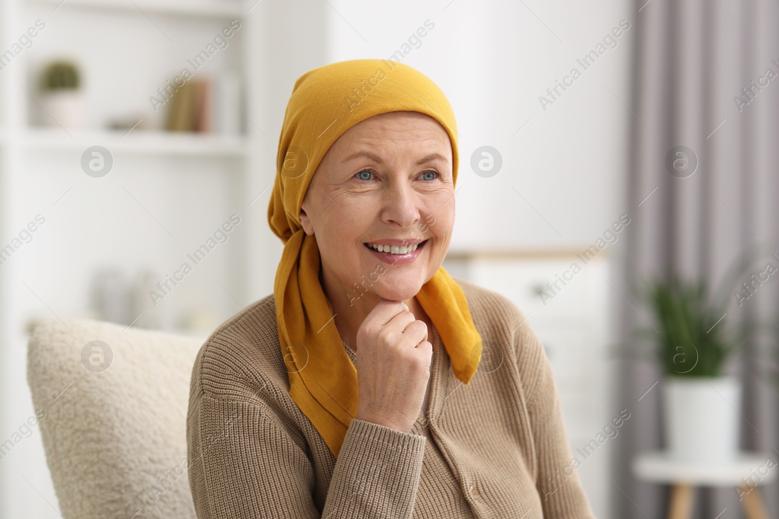 Photo of Portrait of senior woman with cancer at home