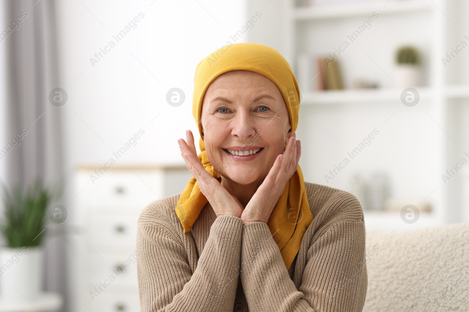 Photo of Portrait of senior woman with cancer at home