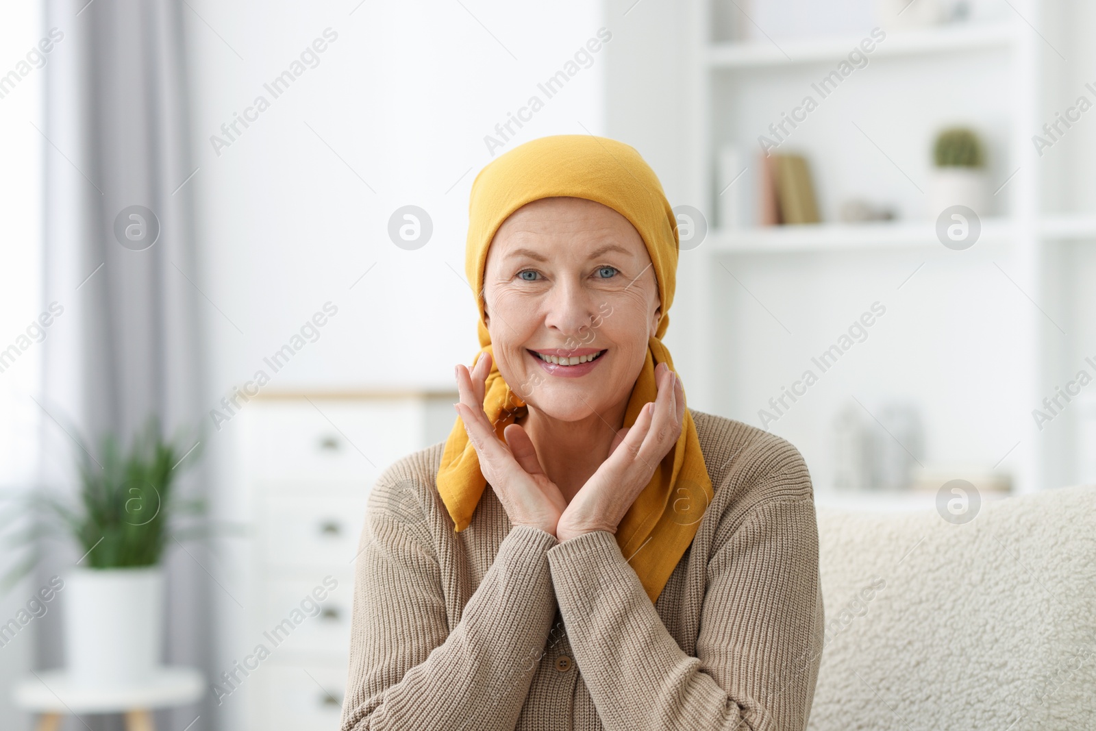 Photo of Portrait of senior woman with cancer at home