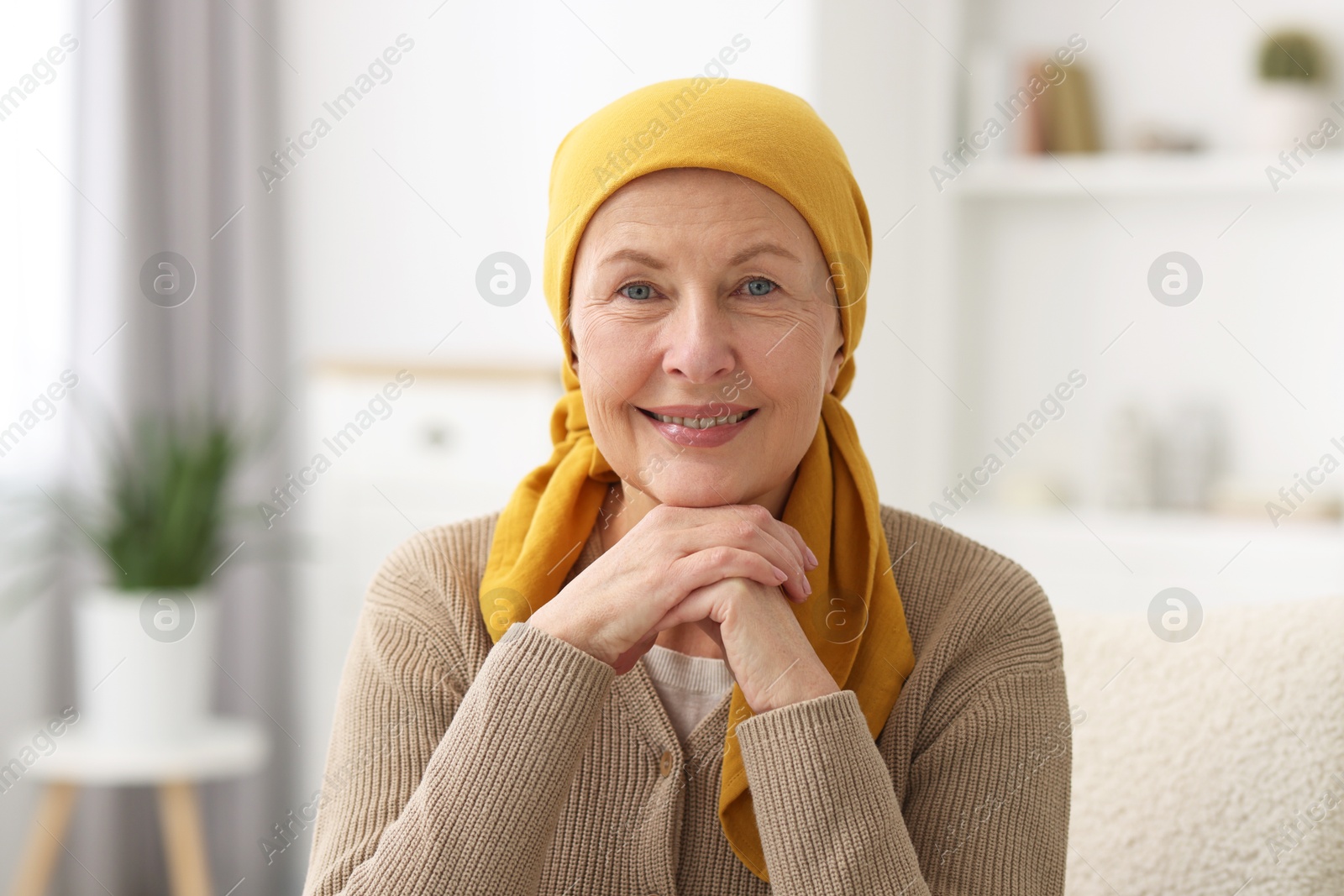 Photo of Portrait of senior woman with cancer at home