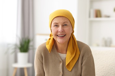 Photo of Portrait of senior woman with cancer at home