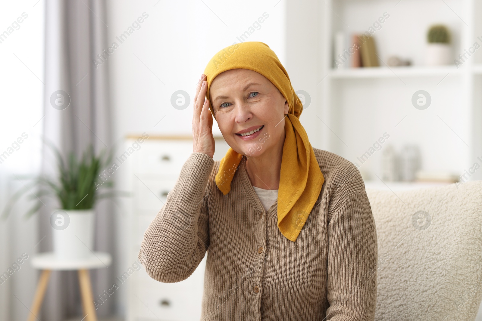 Photo of Portrait of senior woman with cancer at home