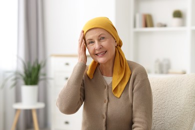 Photo of Portrait of senior woman with cancer at home