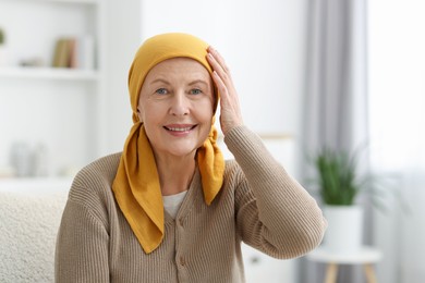 Photo of Portrait of senior woman with cancer at home