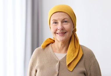 Photo of Portrait of senior woman with cancer at home