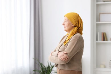 Photo of Portrait of senior woman with cancer at home