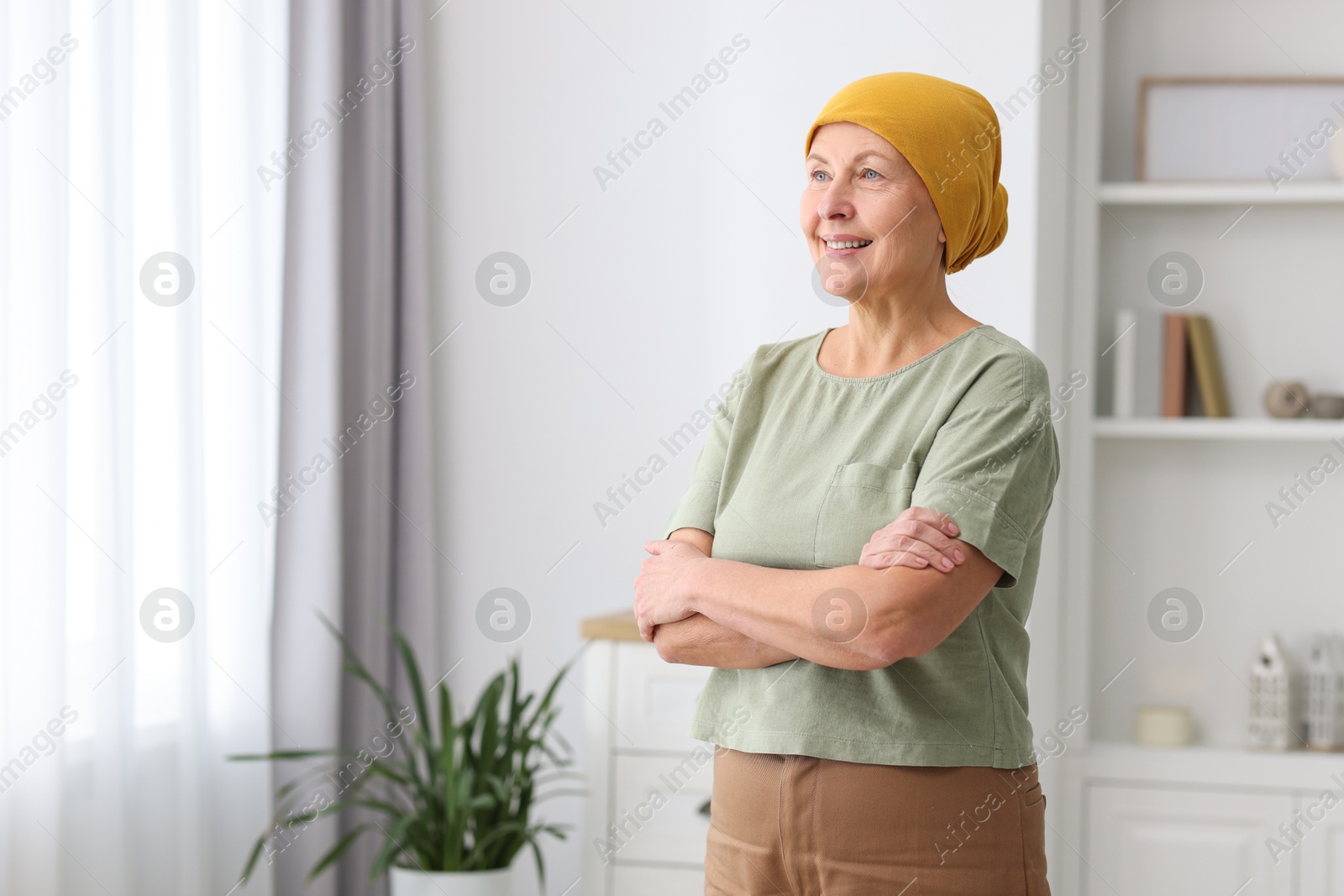 Photo of Portrait of senior woman with cancer at home