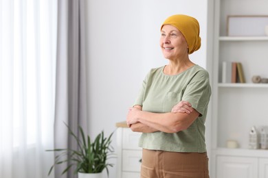 Photo of Portrait of senior woman with cancer at home