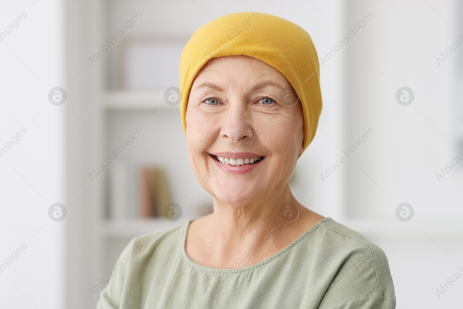 Photo of Portrait of senior woman with cancer at home