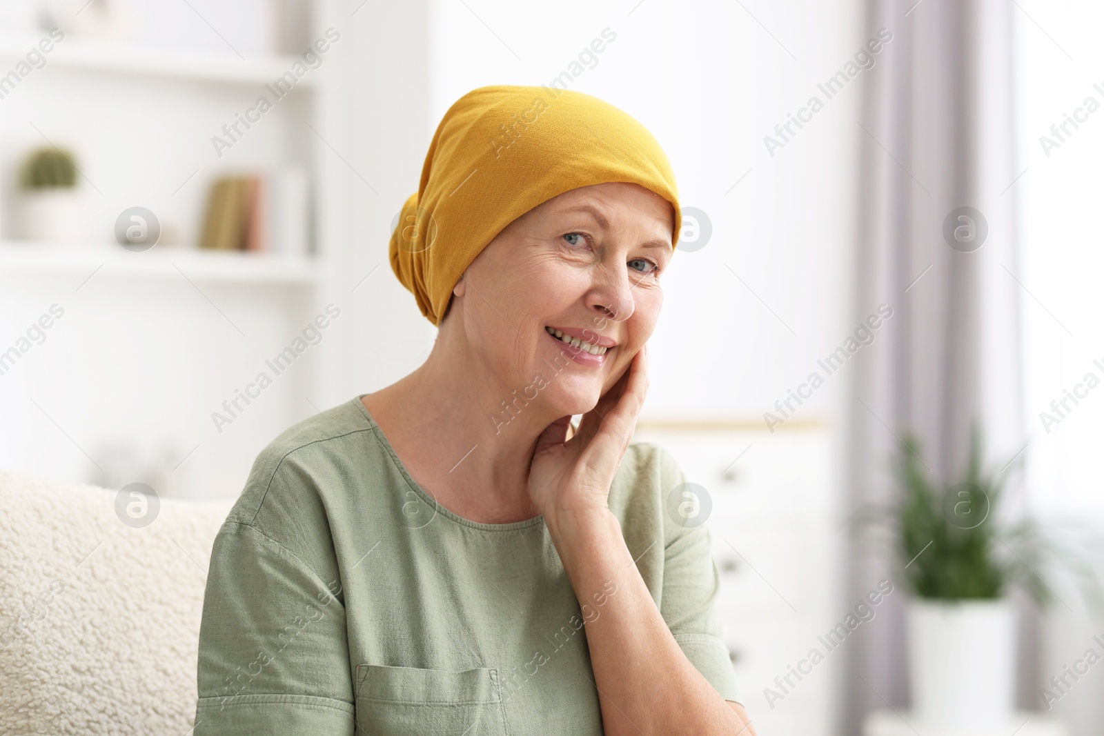 Photo of Portrait of senior woman with cancer at home