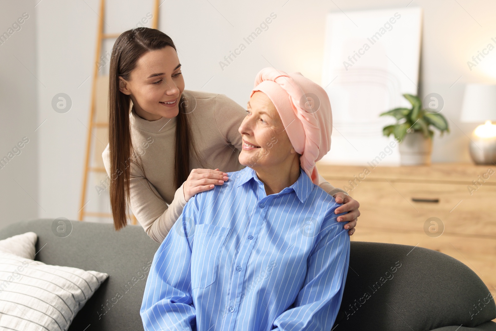 Photo of Woman with cancer and her daughter at home