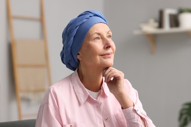 Photo of Portrait of senior woman with cancer at home