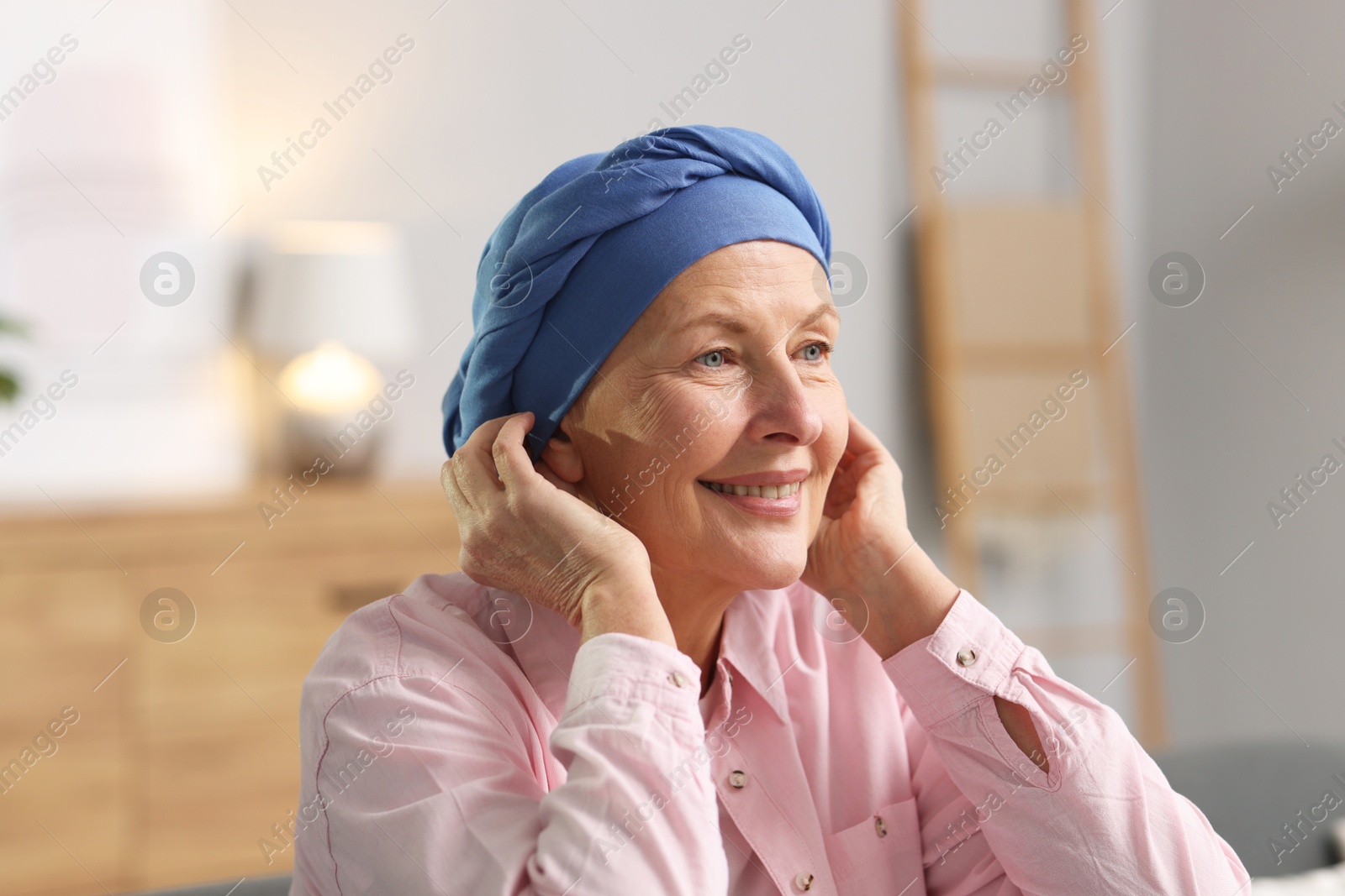 Photo of Portrait of senior woman with cancer at home