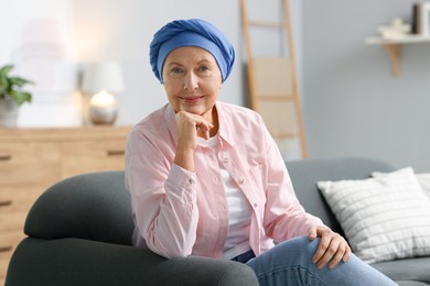 Photo of Senior woman with cancer on sofa at home