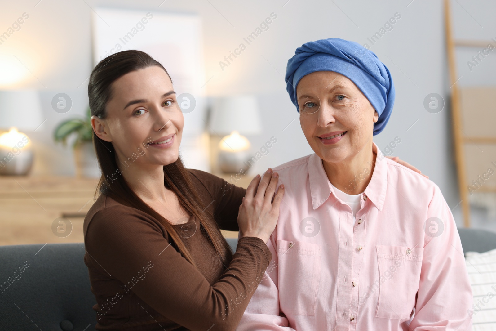 Photo of Woman with cancer and her daughter at home