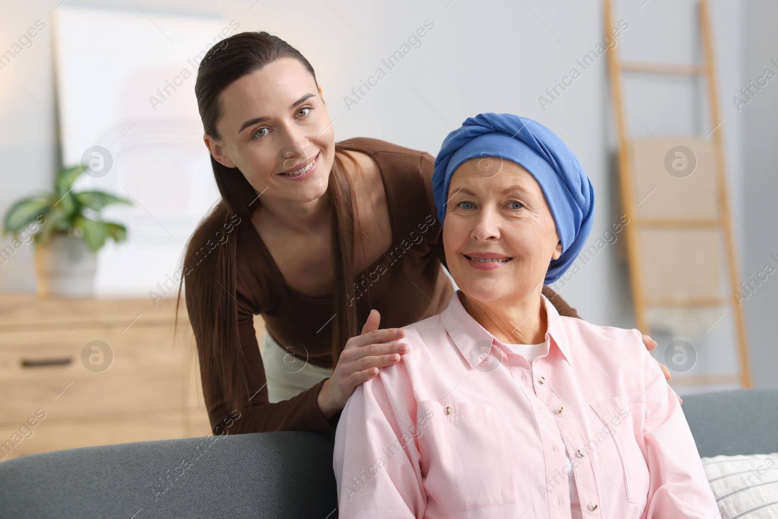 Photo of Woman with cancer and her daughter at home