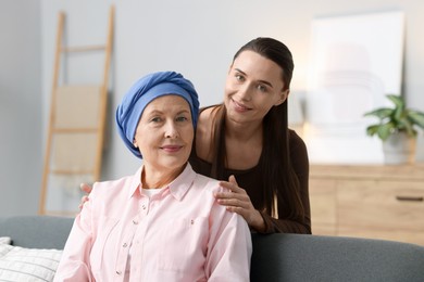 Photo of Woman with cancer and her daughter at home