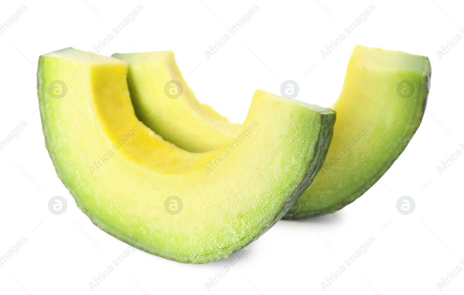 Photo of Pieces of ripe avocado isolated on white