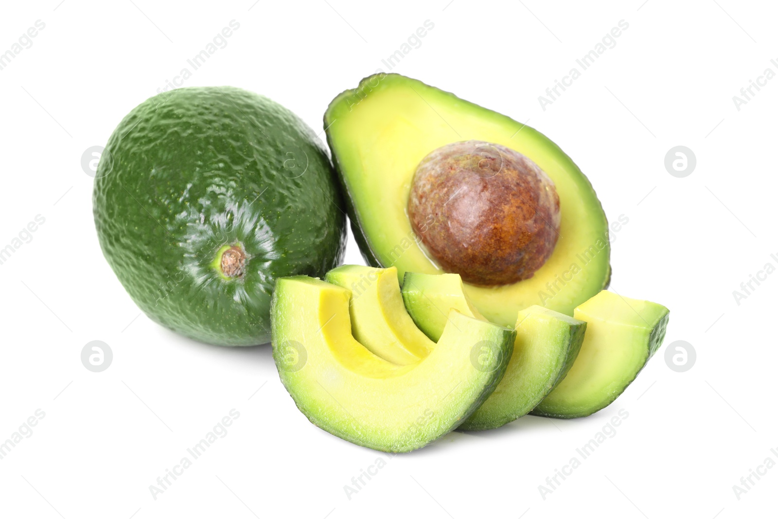 Photo of Whole and cut avocados isolated on white