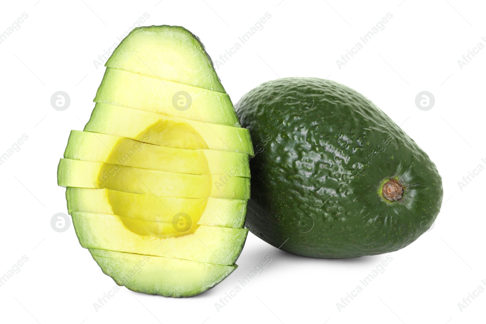 Photo of Whole and cut avocados isolated on white