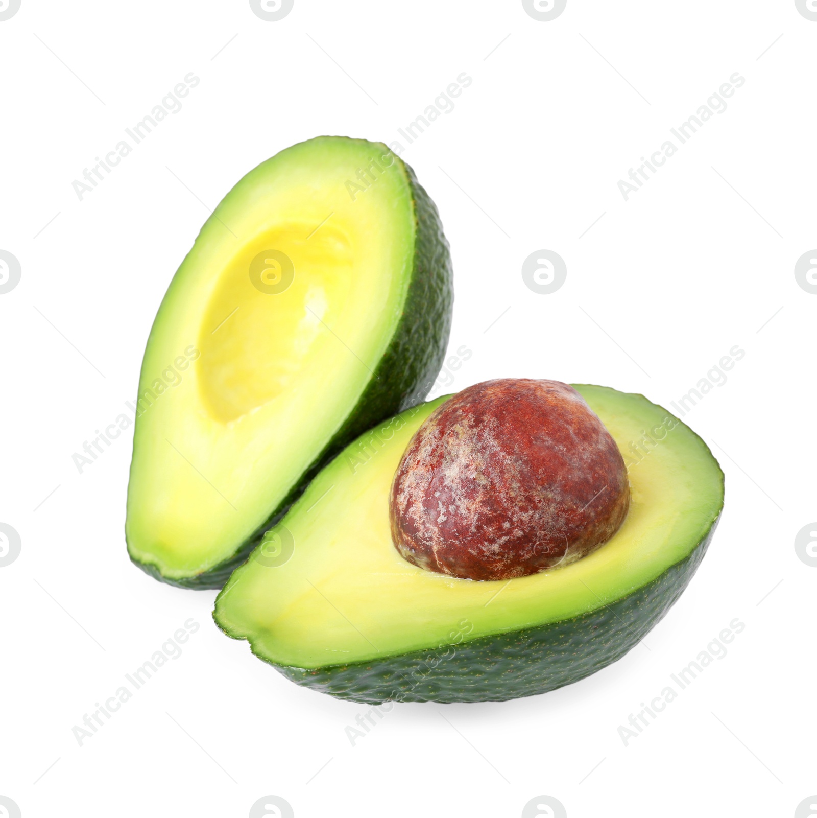 Photo of Halves of ripe avocado isolated on white