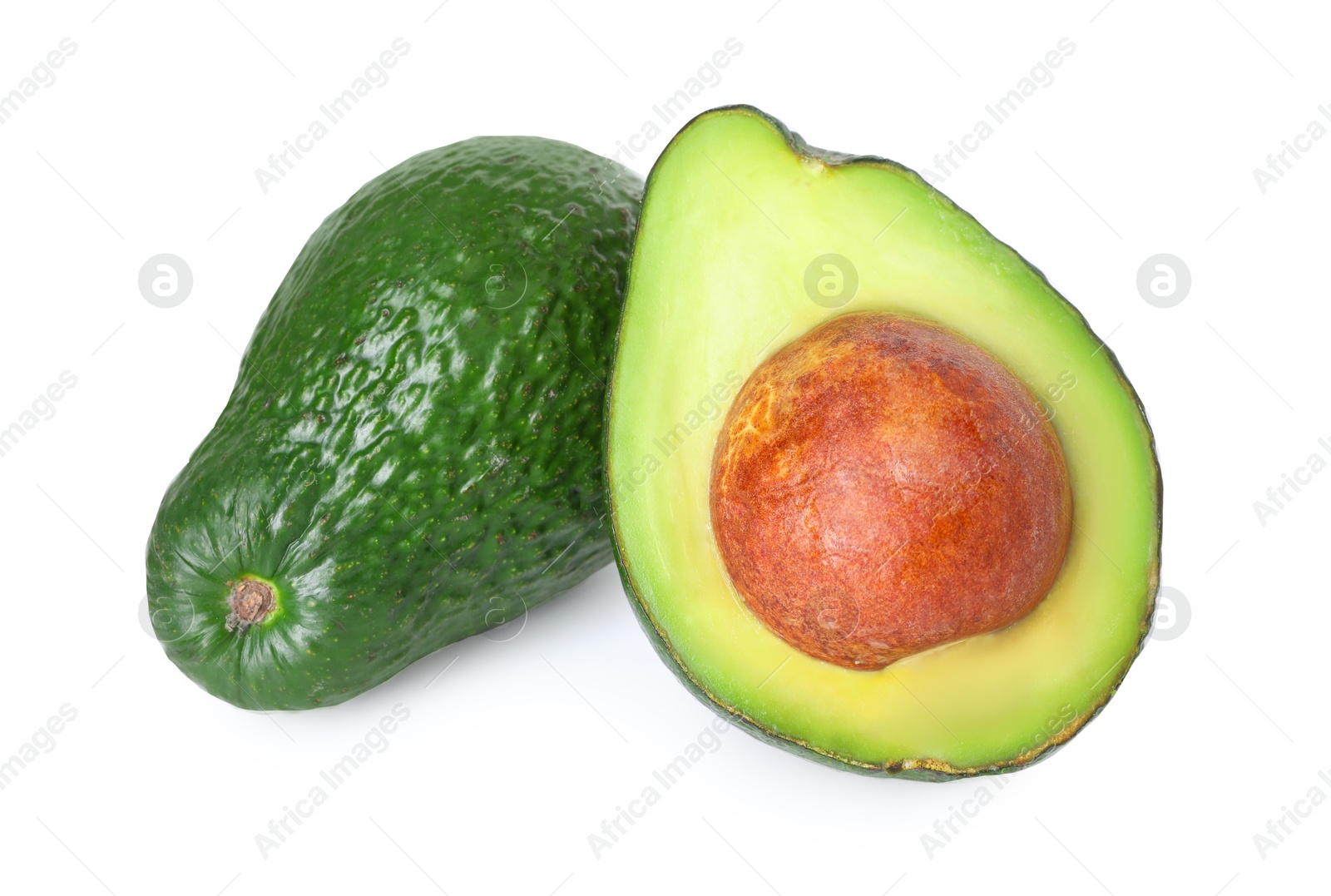 Photo of Whole and cut avocados isolated on white, top view