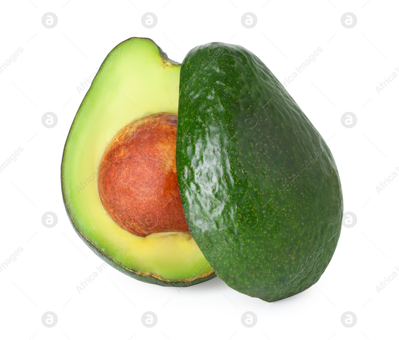 Photo of Halves of ripe avocado isolated on white