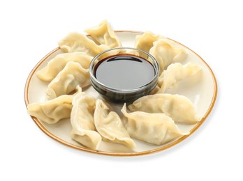 Photo of Tasty boiled gyoza (dumplings) with soy sauce on white background